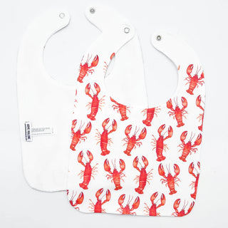 White bib with red lobster pattern on a white background