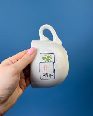 Shop the Gumbo Mug featuring durable ceramic construction, oversized design, comfortable handle, and unique artwork. Available in multiple styles.