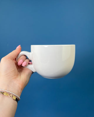 Shop the Gumbo Mug featuring durable ceramic construction, oversized design, comfortable handle, and unique artwork. Available in multiple styles.