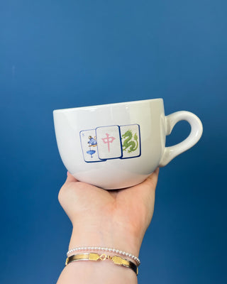 Shop the Gumbo Mug featuring durable ceramic construction, oversized design, comfortable handle, and unique artwork. Available in multiple styles.