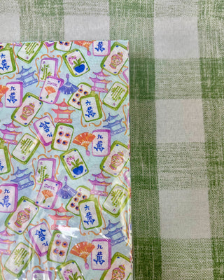 Colorful Mahjong Guest Napkins featuring watercolor Mahjong tiles, pagodas, fans, and floral artwork for game night entertaining and party décor.