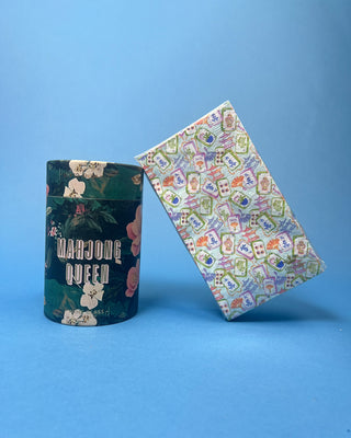 Colorful Mahjong Guest Napkins featuring watercolor Mahjong tiles, pagodas, fans, and floral artwork for game night entertaining and party décor.