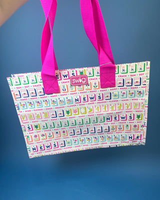 Mahjong Reusable Bag with colorful Mahjong tile print and bright pink handles, foldable reusable shopping tote for errands, gifts, and game nights.