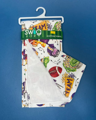 Swig Life Tailgates In Baton Rouge cotton kitchen towel featuring Baton Rouge football, stadium, helmets, footballs, and purple and gold game day illustrations.