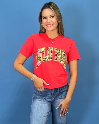 a red graphic t-shirt with leopard print lettering that reads 'LULU MAC"