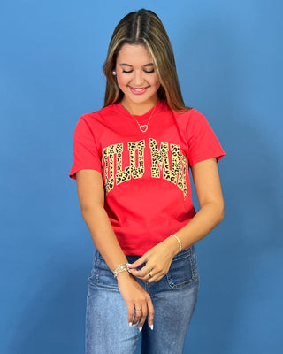 a red graphic t-shirt with leopard print lettering that reads 'LULU MAC"