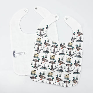 Baby bib with duck pattern on a white background