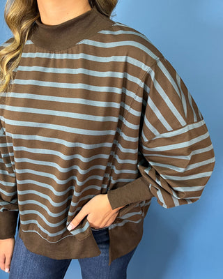 Chocolate brown and dusty blue striped pullover top with mock neckline, long sleeves, ribbed trim, and relaxed fit.