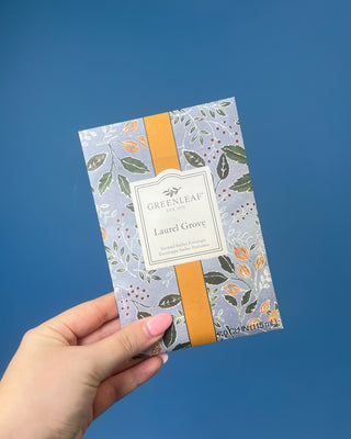 Close-up of the Greenleaf Laurel Grove sachet packaging featuring the botanical artwork and fragrance label.