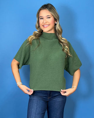 Olive green ribbed mock neck sweater top with short dolman sleeves, relaxed fit, and a soft, versatile everyday look.