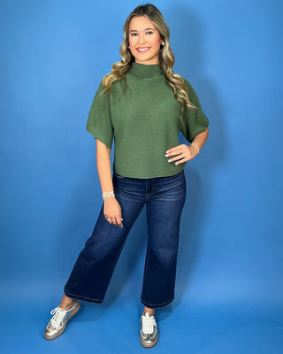Olive green ribbed mock neck sweater top with short dolman sleeves, relaxed fit, and a soft, versatile everyday look.