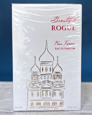 Perfume bottle and packaging of 'Beautiful Rogue' on a blue background