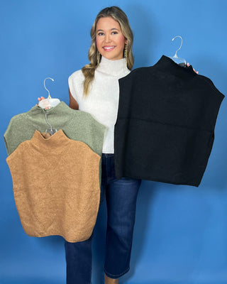 Sleeveless ribbed knit mock neck sweater tops with chevron stitch detailing, shown in ivory, sage green, camel, and black.