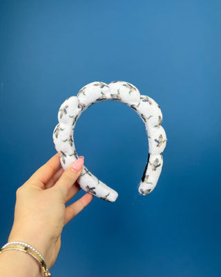 Duck print padded braided headband with soft white fabric and flying duck pattern. 