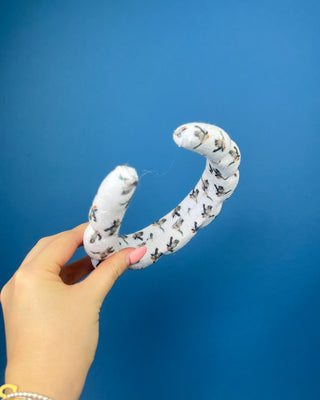 Duck print padded braided headband with soft white fabric and flying duck pattern.