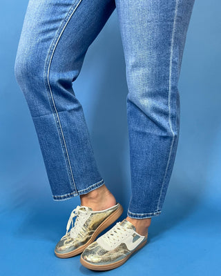 Medium wash high-rise straight leg jeans with subtle fading, a clean hem, classic five-pocket styling, and an ankle-length fit.