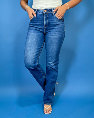 Medium-to-dark wash high-rise straight leg jeans with subtle fading, a clean finish, classic five-pocket styling, and a full-length silhouette.