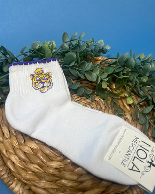 White LSU ankle socks with purple scalloped trim and an embroidered LSU Tiger logo, featuring a soft knit fabric and ribbed cuff for comfortable everyday wear.