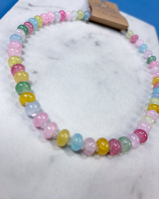 Pastel multi-color crackle plastic beaded necklace with crystal-style spacer beads and an adjustable silver-tone chain.