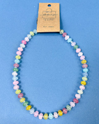 Pastel multi-color crackle plastic beaded necklace with crystal-style spacer beads and an adjustable silver-tone chain.