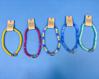 Colorful plastic beaded necklace with a gold-tone toggle clasp available in multiple colors for women.