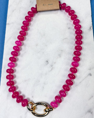 Colorful plastic beaded necklace with a gold-tone toggle clasp available in multiple colors for women.