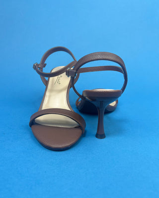 Brown Single Strap 3in Heel Open Toe Heel against a solid blue background. 