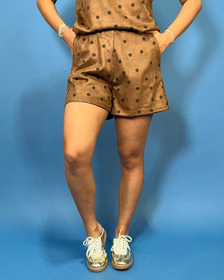 brown shorts with a black polka dot pattern