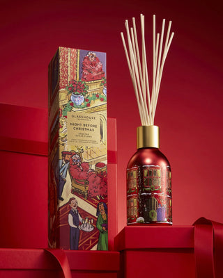Holiday reed diffuser with Dancing Sugar Plums scent by Glasshouse Fragrances in collectible Christmas packaging