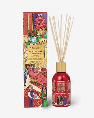 Holiday reed diffuser with Dancing Sugar Plums scent by Glasshouse Fragrances in collectible Christmas packaging