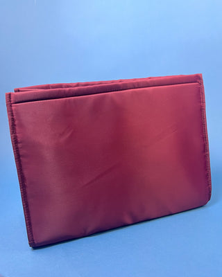 Case Mate Tote Bag Organizer Inserts in Colors Mulberry, Ballet Pink, & French Vanilla displayed against a slid blue background. 