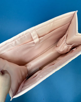 Case Mate Tote Bag Organizer Inserts in Colors Mulberry, Ballet Pink, & French Vanilla displayed against a slid blue background. 