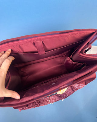 Case Mate Tote Bag Organizer Inserts in Colors Mulberry, Ballet Pink, & French Vanilla displayed against a slid blue background. 