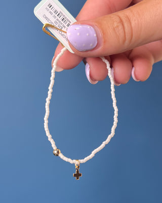 Hope Classic Signature Cross Milkshake Bracelet displayed against a solid blue background. 