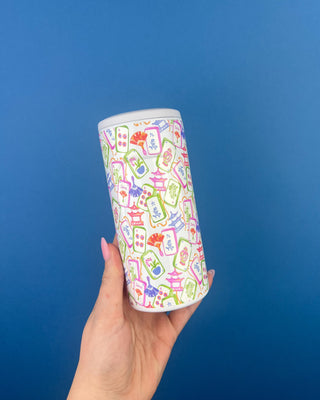 Mahjong Themed Slim Can Cooler Displayed Against a Solid Blue Background. 