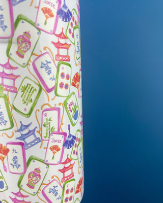 Mahjong Themed Slim Can Cooler Displayed Against a Solid Blue Background. 
