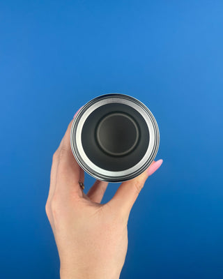 Mahjong Themed Slim Can Cooler Displayed Against a Solid Blue Background. 