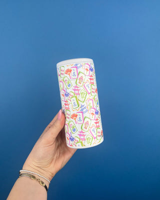 Mahjong Themed Slim Can Cooler Displayed Against a Solid Blue Background. 