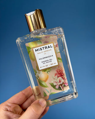 Mistral Luxury Shower Gel in Vai Beach and Palombaggia fragrances, 8.7 fl oz French-made foaming body wash with botanical packaging, aloe, chamomile water, and sweet almond oil for soft, refreshed skin.