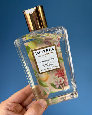 Mistral Luxury Shower Gel in Vai Beach and Palombaggia fragrances, 8.7 fl oz French-made foaming body wash with botanical packaging, aloe, chamomile water, and sweet almond oil for soft, refreshed skin.
