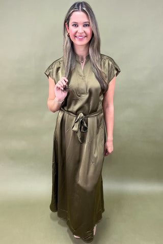 Olive satin midi dress with tie waist, cap sleeves, and v-neckline—an elegant and versatile look for day to night