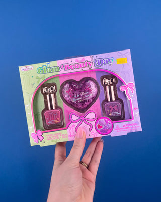 Shop the Glam Beauty Day Gift Set featuring a heart-shaped lip balm, lip applicator, and two nail polishes. A fun beauty gift for kids ages 5+.