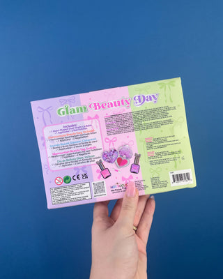 Shop the Glam Beauty Day Gift Set featuring a heart-shaped lip balm, lip applicator, and two nail polishes. A fun beauty gift for kids ages 5+.