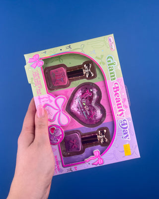 Shop the Glam Beauty Day Gift Set featuring a heart-shaped lip balm, lip applicator, and two nail polishes. A fun beauty gift for kids ages 5+.