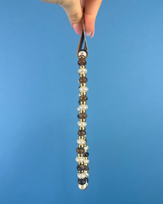Shop the Coco Beaded Necklace in Brown & Gray featuring marbled beads, faux pearls, gold accents, and an adjustable chain. More Colors available.