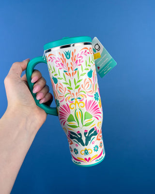 Shop the Swig Mega Mug 30oz with a colorful floral design, leakproof lid, reusable straw, and triple insulation that keeps drinks cold 24+ hours.