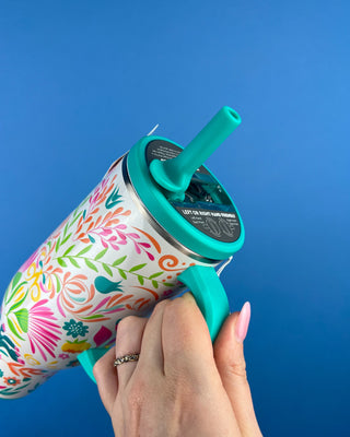 Shop the Swig Mega Mug 30oz with a colorful floral design, leakproof lid, reusable straw, and triple insulation that keeps drinks cold 24+ hours.