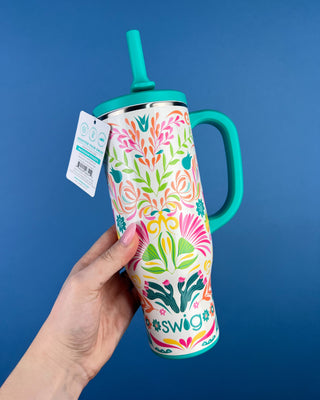 Shop the Swig Mega Mug 30oz with a colorful floral design, leakproof lid, reusable straw, and triple insulation that keeps drinks cold 24+ hours.