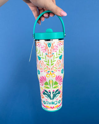 Shop the Swig To-Go Tumbler 30oz featuring a leakproof lid, folding carry handle, reusable straw, and triple insulation for all-day hot or cold drinks.