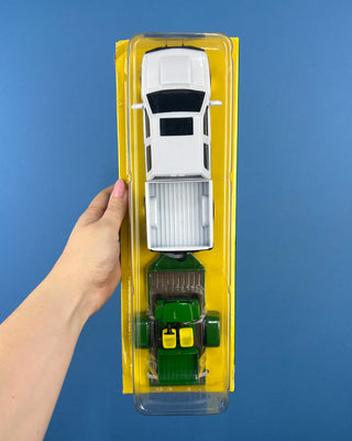 Shop the John Deere Pickup Hauling Set featuring a pickup truck, trailer, and riding mower. Officially licensed by John Deere for ages 3+.